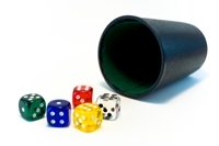 Cup with Colored Dice rolling out. Cup with Colored Dice rolling out.